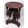 Image 1 : Heavily carved stand with stork motif
