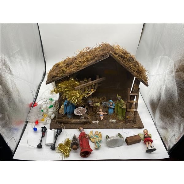 An Charming Assortment of Nativity Figures/Houses