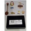 Image 1 : An Assortment of Emblem-Themed Pins/Spoon