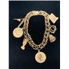 Image 1 : 14K CHARM BRACELET WITH SEVEN 10K+ CHARMS (30.7G)