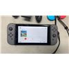 Image 8 : NINTENDO SWITCH CONSOLE WITH CHARGING DOCK, PIXARK GAME, 2 SETS OF JOYCONS AND SURGE WIRELESS PRO CO