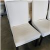 Image 2 : 6 WHITE IKEA DINING CHAIRS WITH 4 NEW COVERS