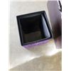 Image 2 : LEATHER OTTOMAN AND PURPLE OTTOMAN