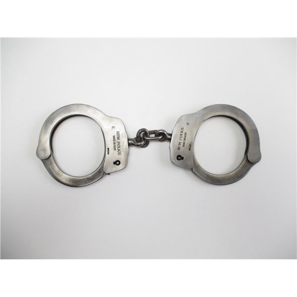 "NEW POLICE" HAND CUFFS