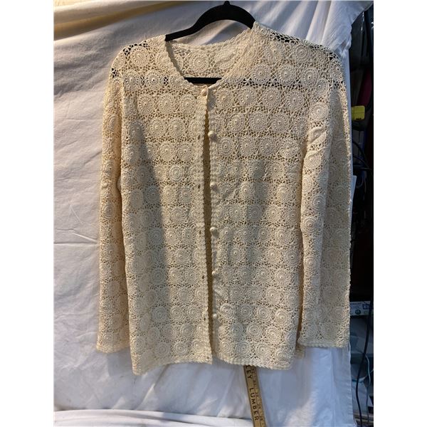 Sweater size not shown