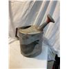 Rustic watering can