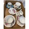 Tea cups and saucers, cream and sugar etc
