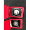 Image 1 : LOT OF 2 CASED CANADIAN DOLLARS