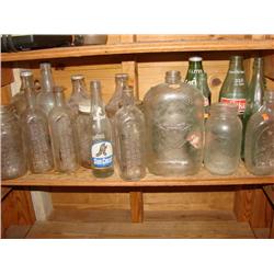 21 Old Bottles in Apple Bushel Basket