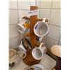 Image 2 : Wooden Cup Tree With multiple Tea Pots, Cups, & Saucers, A Vase, Gravy Boat, and more