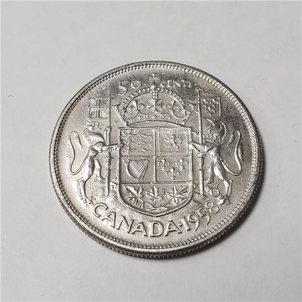 S131-86 SILVER CANADIAN 50CENT COIN