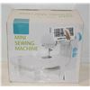 Image 1 : MINI SEWING MACHINE IN BOX