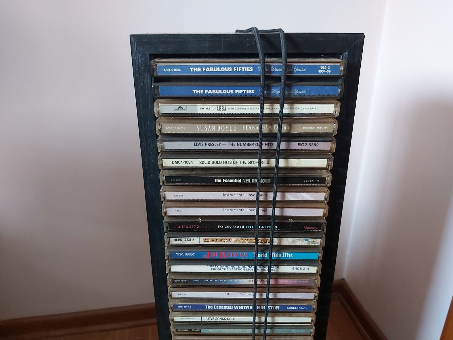 CD Tower With Assortment Of CDs - Beck Auctions Inc.