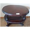 Image 1 : Oval Shaped Three Tier Wooden Table