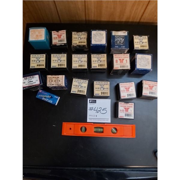 Small level With Assorted Boxes Of Various Screws, Nuts, And More