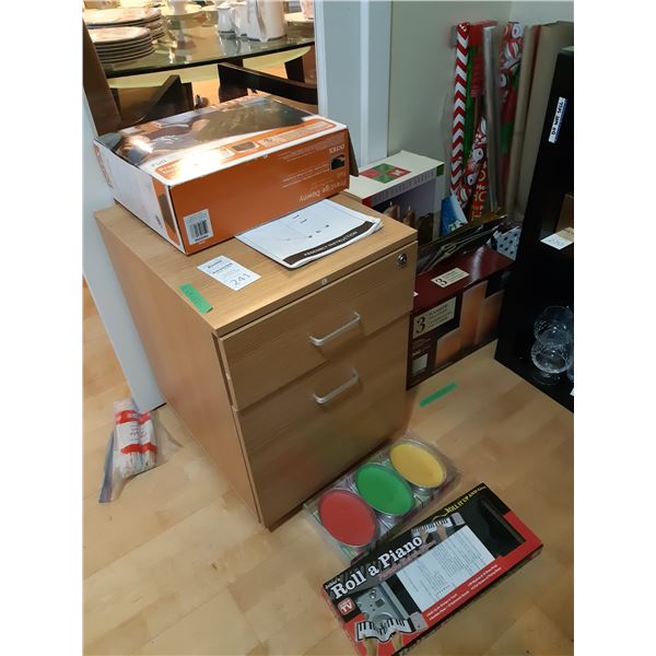 2 drawer cabinet, air mattress, toy piano. Cat B