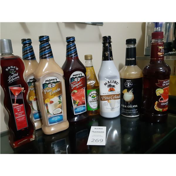8 bottles of drink mixers. Cat A