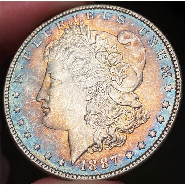 Rainbow Toned 1887 Morgan Silver Dollar MS64