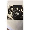 Image 2 : AUTOGRAPHED U2 HAND SIGNED 45 ALBUM W/ ALL 4 MEMBERS BONO, EDGE, ETC AND COA