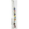 Image 2 : STERLING CHARM BRACELET LOADED WITH CHARMS