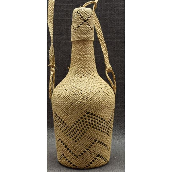 BASKETRY COVERED GLASS BOTTLE