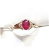 Image 1 : Ladies 10 K Gold Split Shank Ring with Oval Cut Ruby 1.00 Carat, 2 x brilliant cut diamonds .05Carat