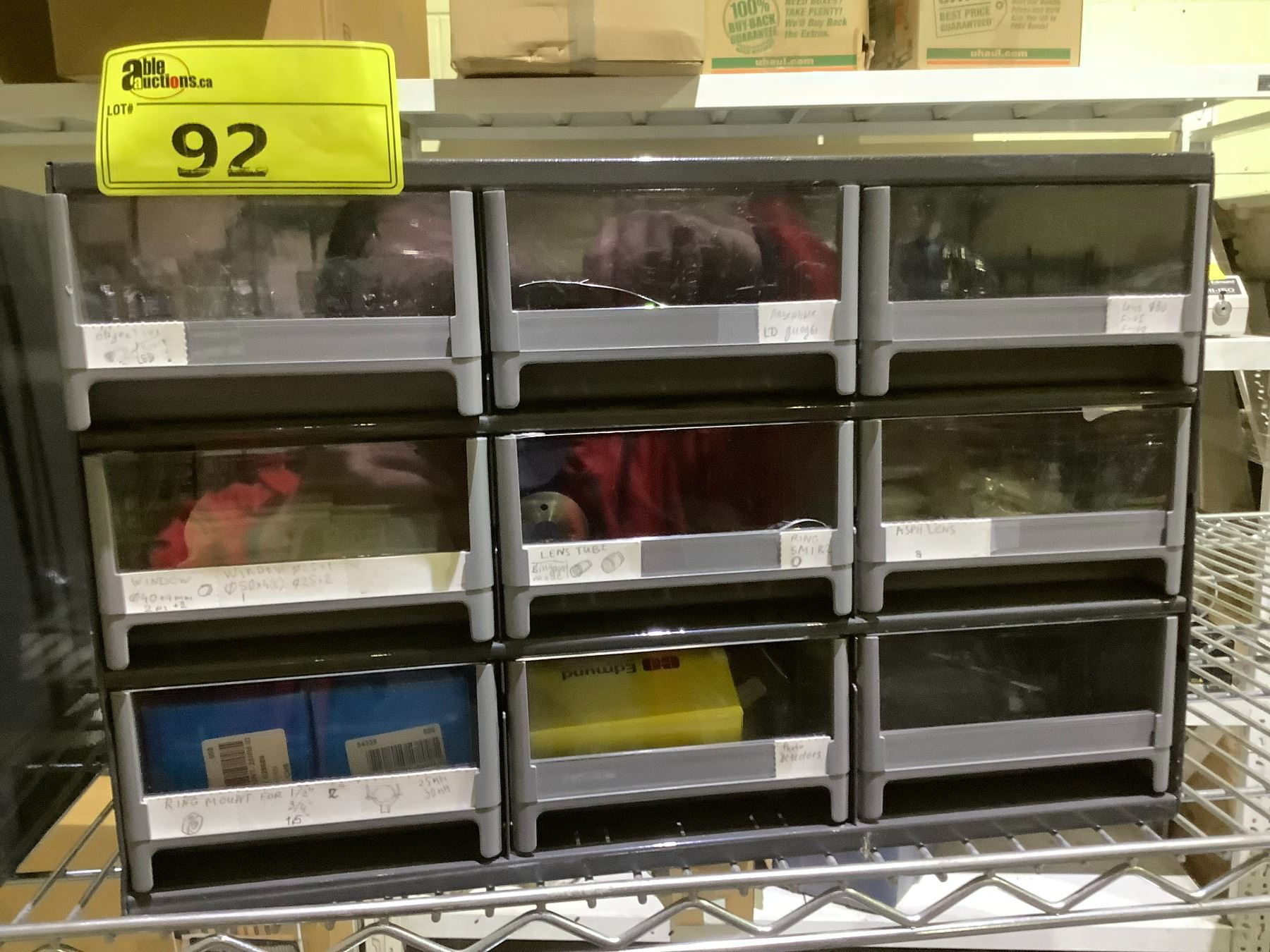 ORGANIZER WITH ASSORTED NEWPORT OPTICS PARTS & ACCESSORIES - Able Auctions