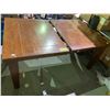 Image 1 : WOOD TABLE 64X42" WITH FOLDOUT LEAF (HEAVY DAMAGE ON TABLE SURFACE)