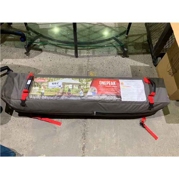 *MAY BE MISSING PARTS OR REQUIRE REPAIR* COLEMAN ONE PEAK OASIS EAVED SHELTER