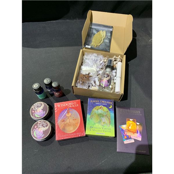 ASSORTED ITEMS INCLUDING; TAROT CARDS, ESSENTIAL OILS, MOSS & STONE CREATIONS & MORE