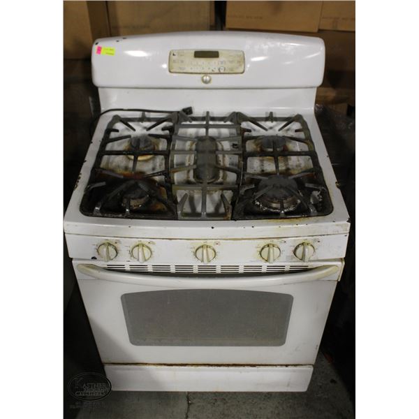 GENERAL ELECTRIC GAS STOVE W/ GRATES - AS IS