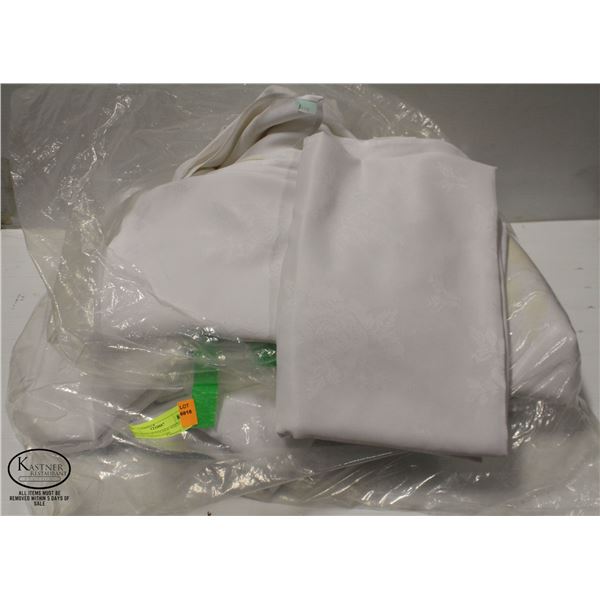 BAG OF FOLDED WHITE NYLON TABLECLOTHS