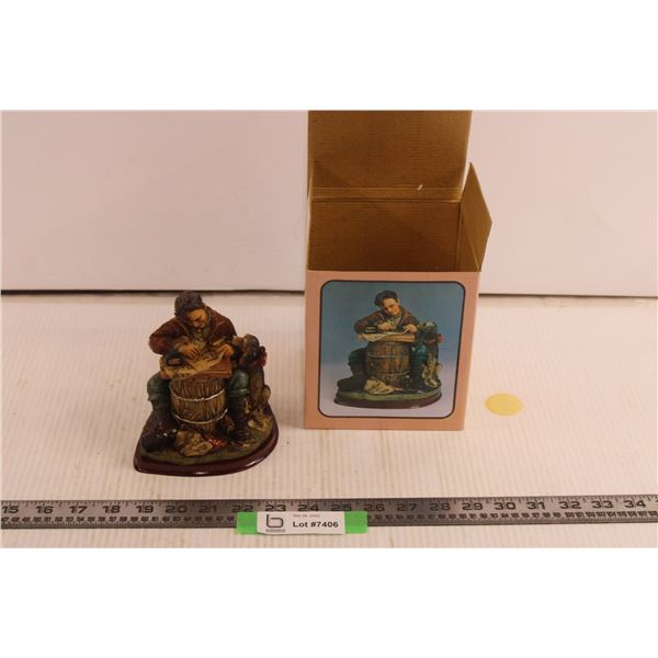 Man with Dog Figurine