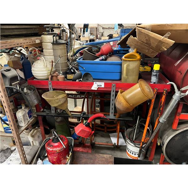 METAL STORAGE RACK WITH OIL CHANGE EQUIPMENT. VACUUM OIL PUMPS, SPOUTS, 2 DOLLIES FOR 45 GALLON