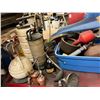 Image 2 : METAL STORAGE RACK WITH OIL CHANGE EQUIPMENT. VACUUM OIL PUMPS, SPOUTS, 2 DOLLIES FOR 45 GALLON