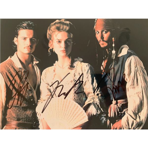 Pirates of the Caribbean cast Orlando Bloom, Johnny Depp, and Keira Knightley signed photo