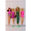 Image 1 : (4) Assorted Barbie Dolls - 1980s (Outfit on Far Right Barbie Has Damage, Some Have Marks on Legs)