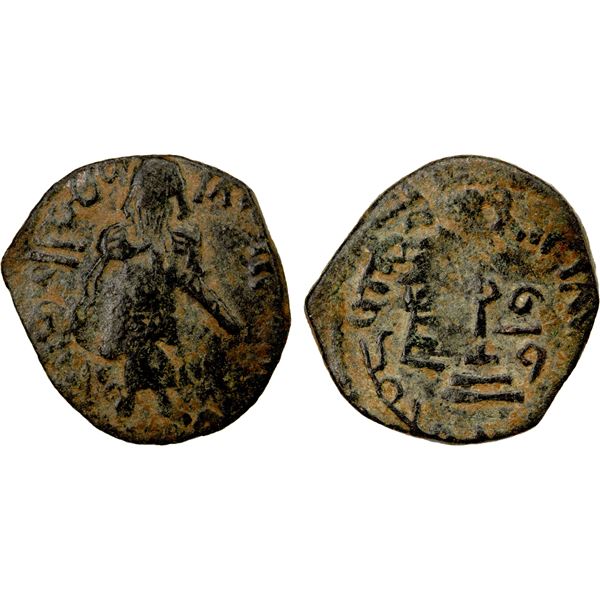 ARAB-BYZANTINE: Standing Caliph, ca. 692-697, AE fals (2.24g), Tanukh, ND, VF