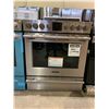 Image 1 : FRGIDAIRE STAINLESS STEEL GLASS TOP 4 BURNER 1 WARMER ELECTRIC STOVE WITH CONVECTION OVEN