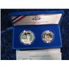 Image 1 : 1126. 1986 Statue of Liberty Half & Silver Dollar Set.