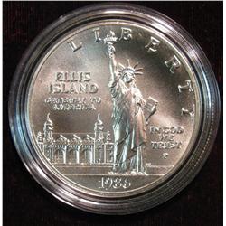 1510. 1986 P Ellis Island Silver Dollar. BU
