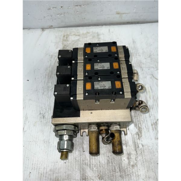 Lot of (3) SMC #VFS4100-5FZ Pneumatic Solenoid Valves Mounted on a Base