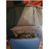 Image 2 : Ice fishing system by clam. Backpack for carrying equipment as well as padded seat. Measures 40" tal
