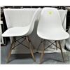 Image 2 : two white plastic/resin molded "bucket" chairs