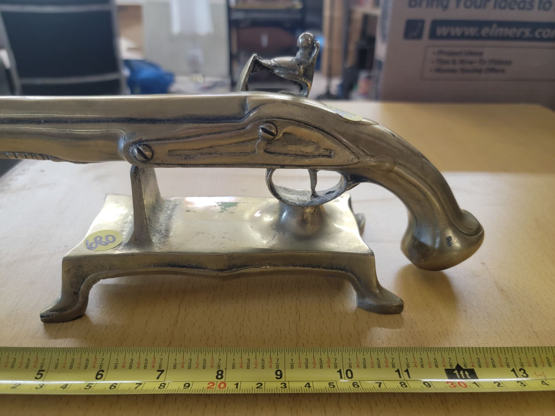 vintage heavy brass flintlock pistol on stand 12