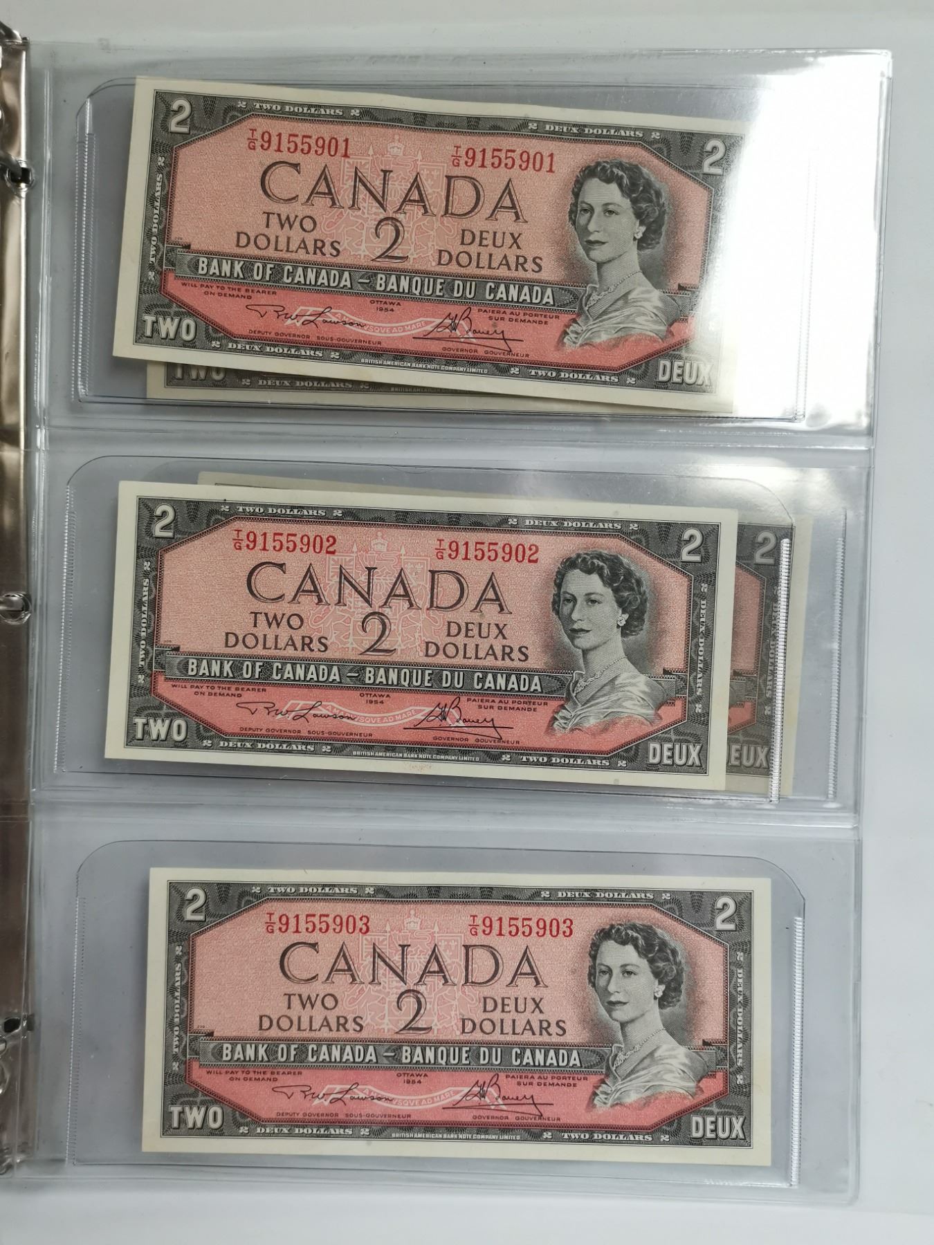 1954 5 UNC 2 Bills In Sequence Schmalz Auctions 1954-5-unc-2-bills-in-sequence-schmalz-auctions