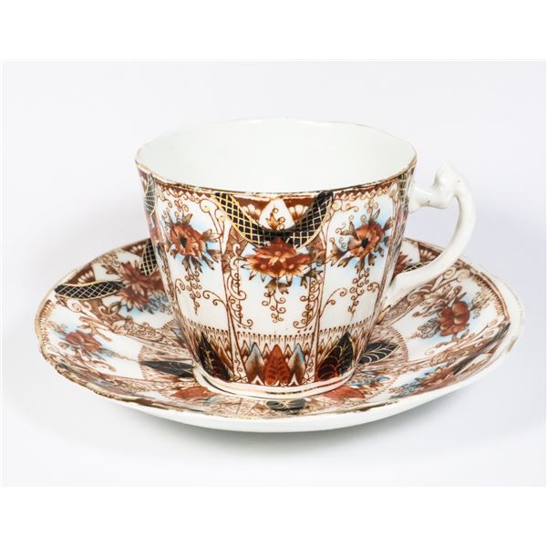 INTRICATE PATTERNED TEACUP AND SAUCER (NO NAME)