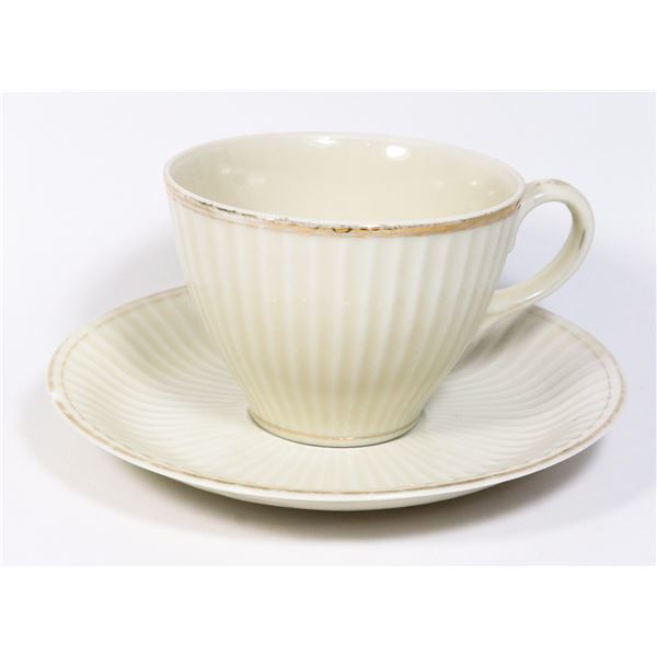 GOLD TONE BOARDER TEA CUP AND SAUCER