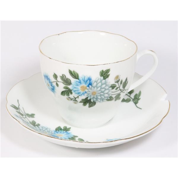 999 BLUE FLOWER PATTERN SAUCER HAS CHIP. TEACUP &