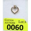 Image 1 : 10 KT Gold and Solitaire Diamond Heart Pendant